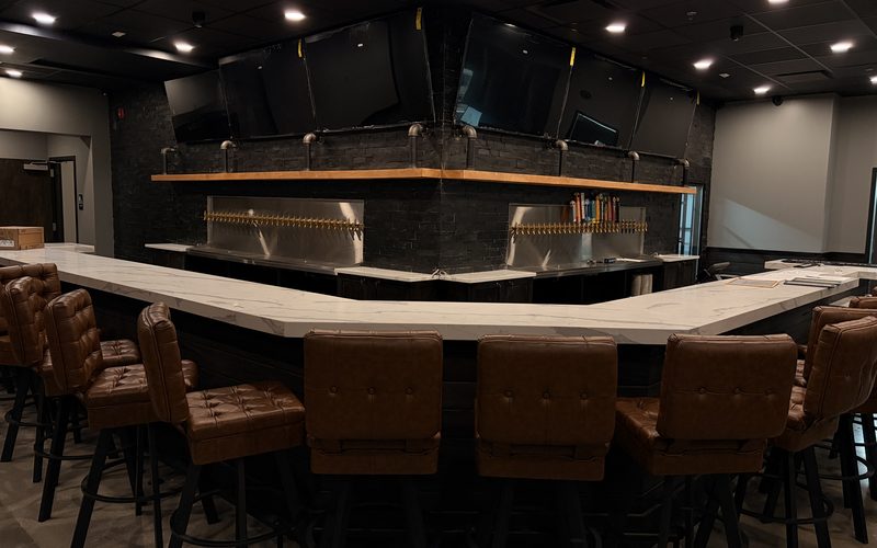 Restaurant bar with multiple commercial displays and beer tap system