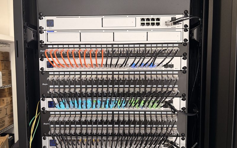 Server rack with structured cabling, patch panels, and Nice controller